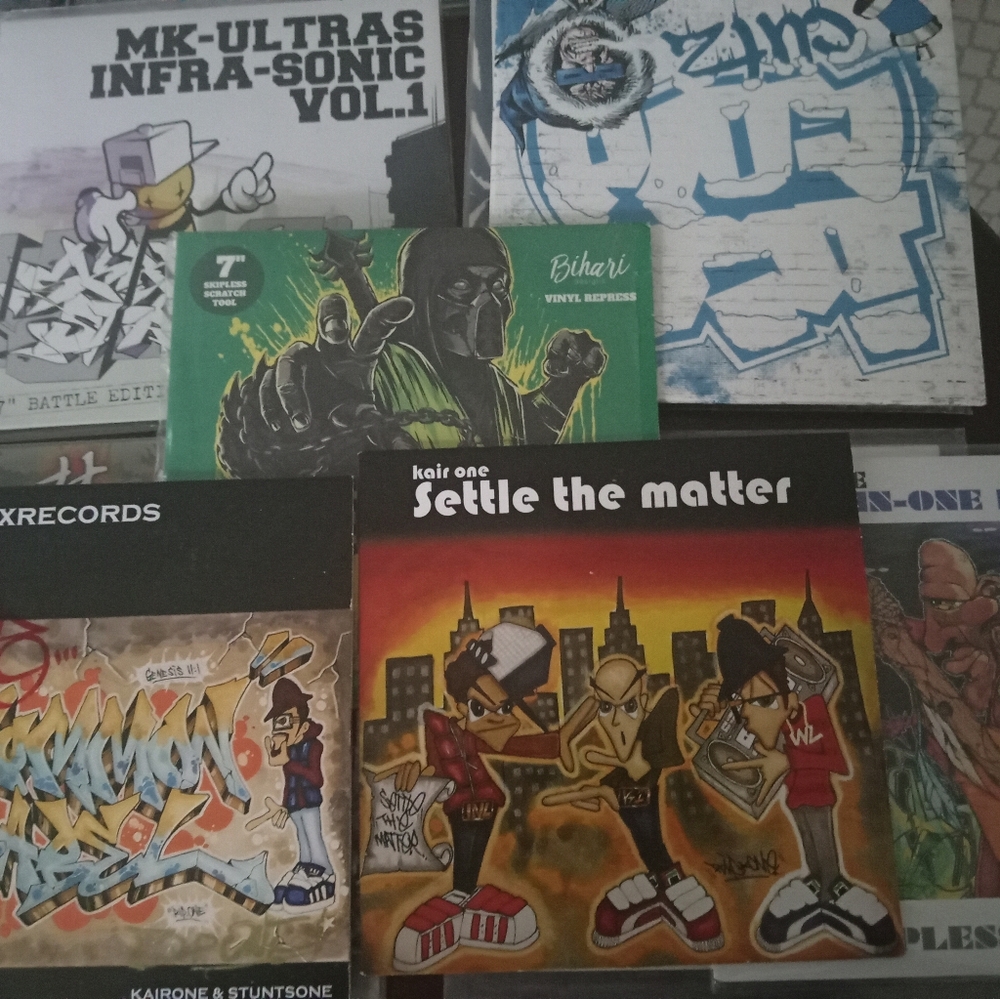 Scratch Record Collection. Rare Q. Bert signed record.